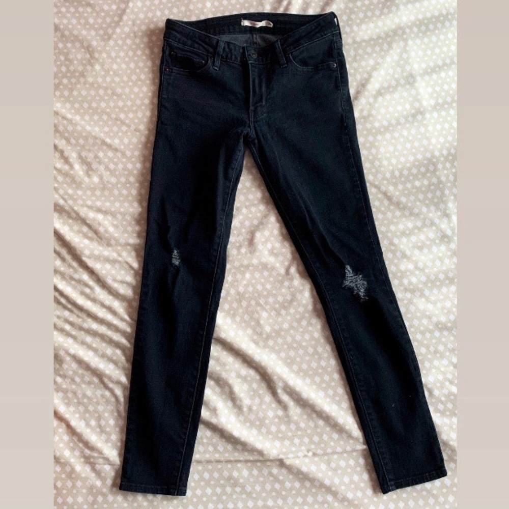 Levi’s 712 Black Distressed Skinny Jeans
